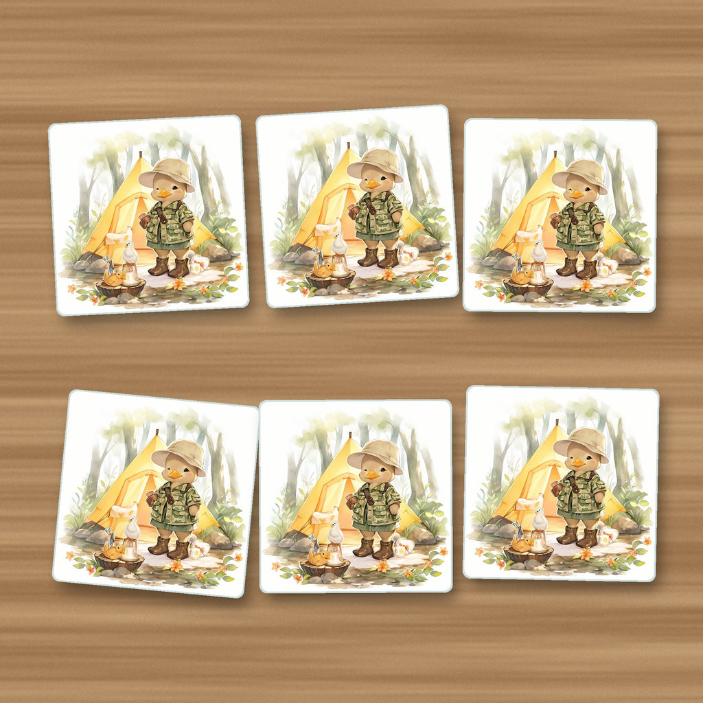 Duckling Camper square glass coasters, set of 6, on an oak coffee table