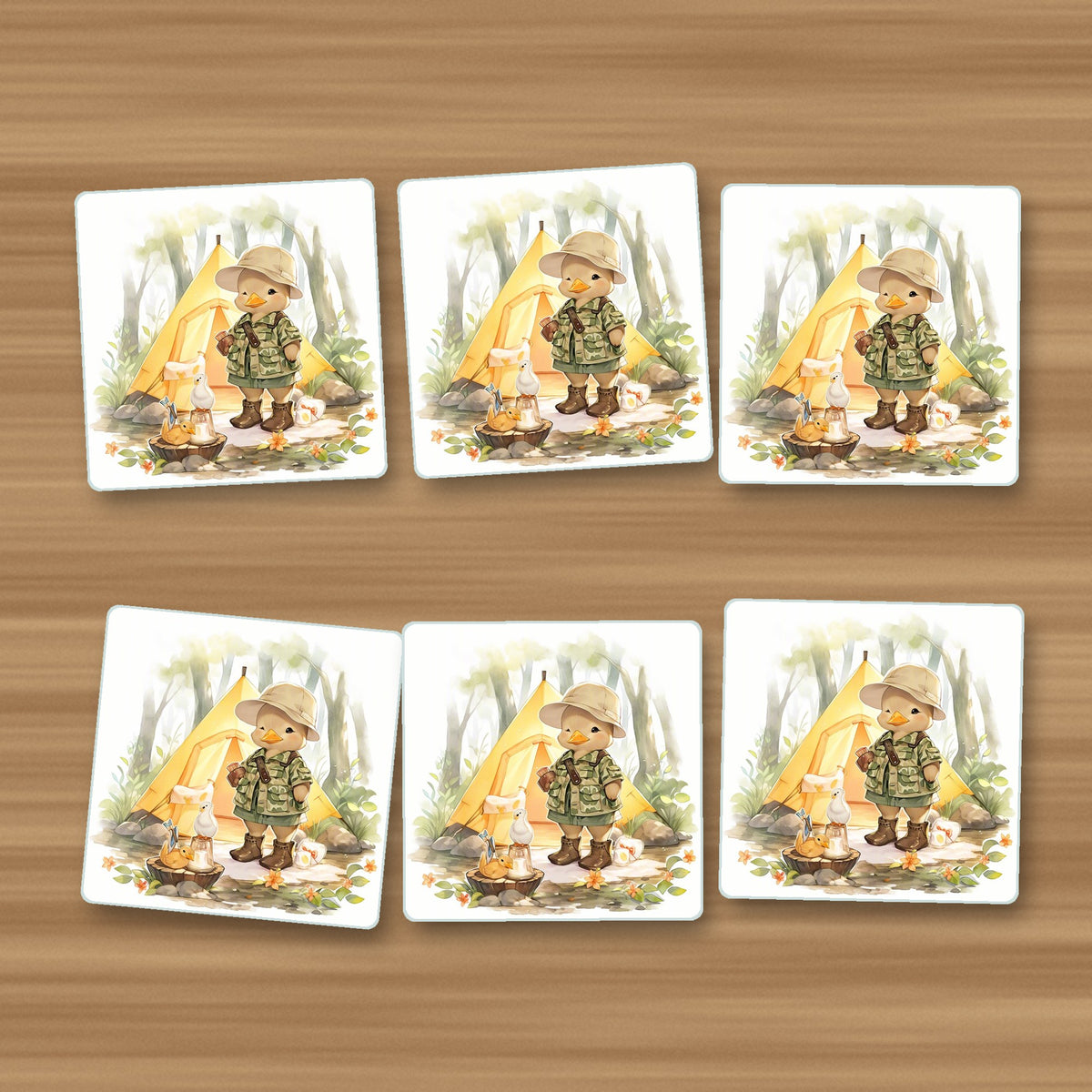Duckling Camper square glass coasters, set of 6, on an oak coffee table