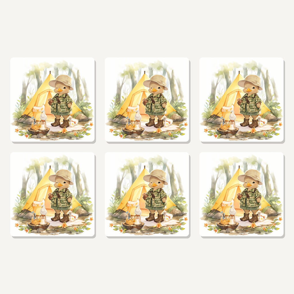 Flat lay of the duckling camper artwork on six square coasters