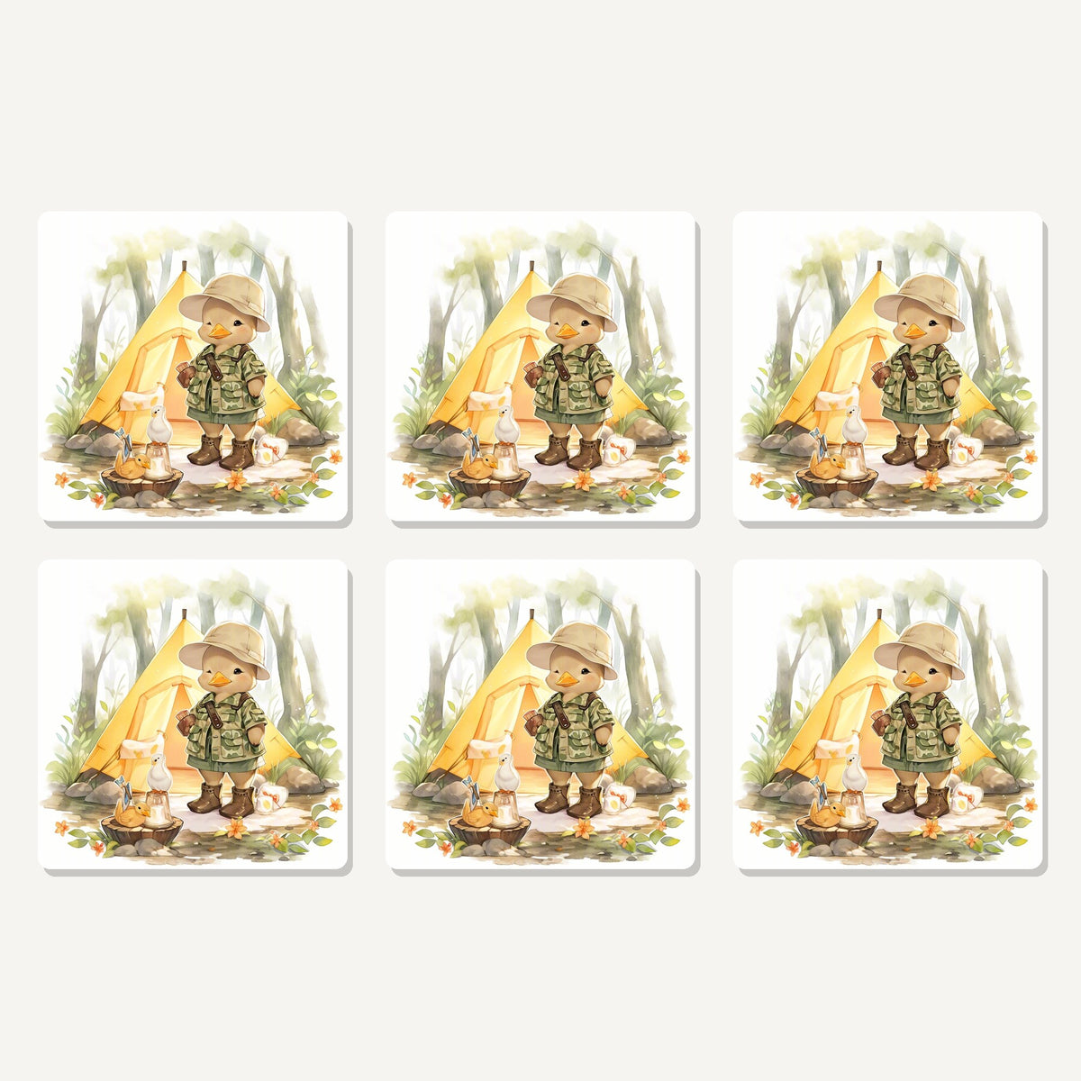 Flat lay of the duckling camper artwork on six square coasters