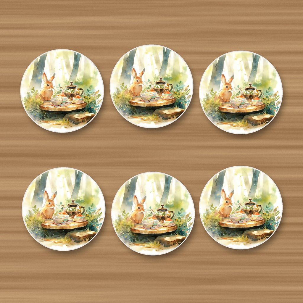Rabbit Woodland Tea Party round ceramic coasters, set of 6, on an oak coffee table