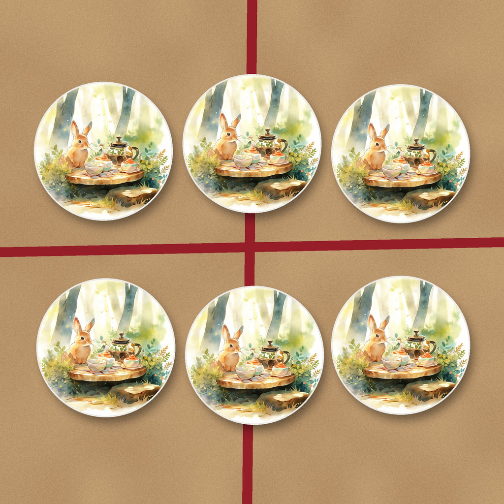 Rabbit Woodland Tea Party round ceramic coasters on kraft gift wrap
