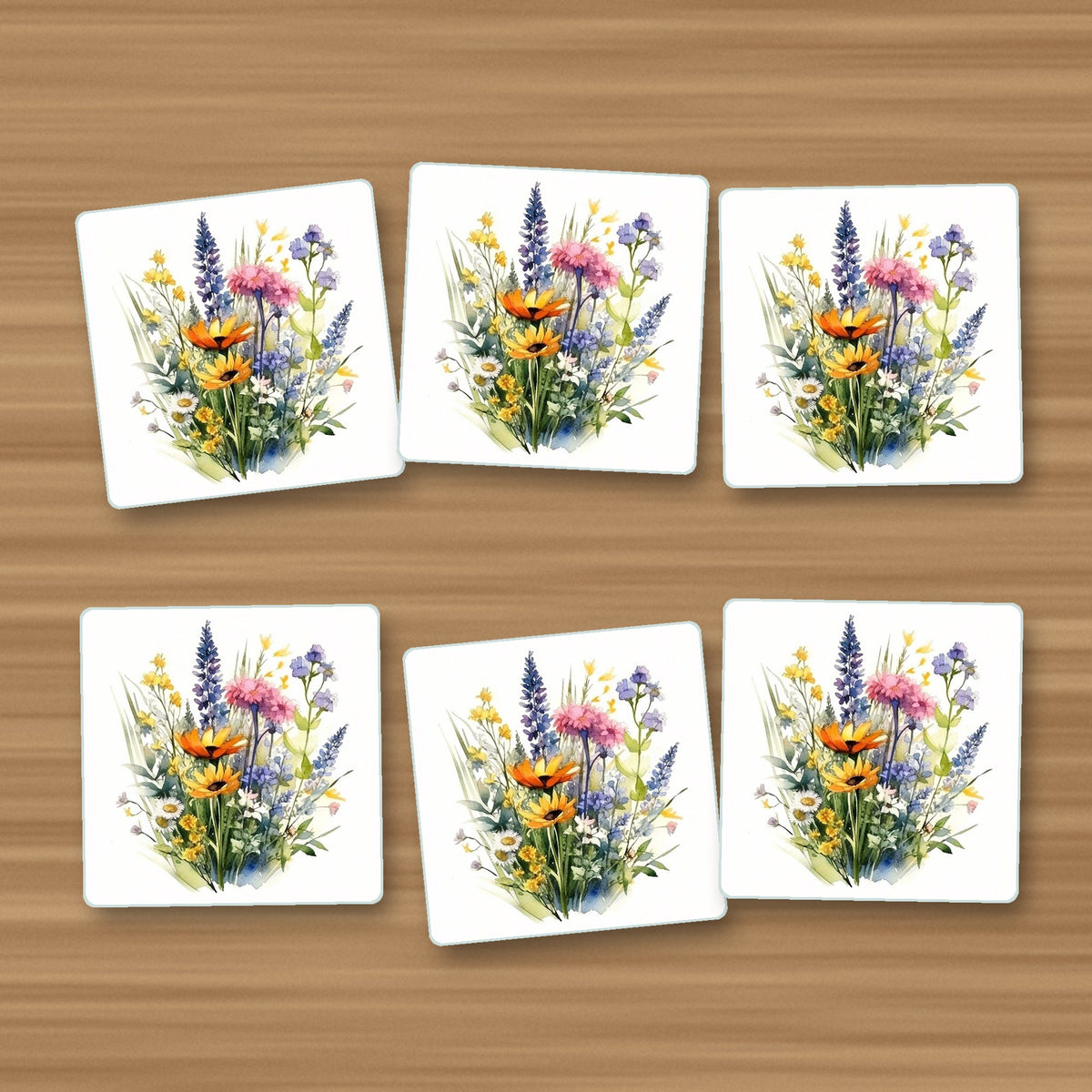 Watercolour Wildflower Posy square glass coasters, set of 6, on an oak coffee table
