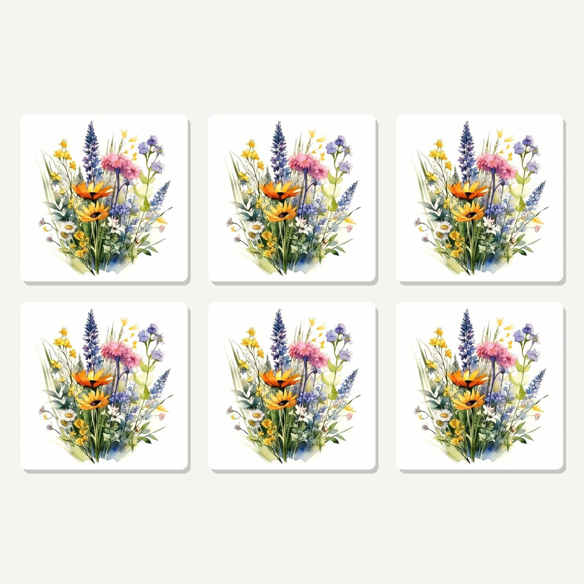 Flat lay of the watercolour wildflower posy artwork on six square coasters