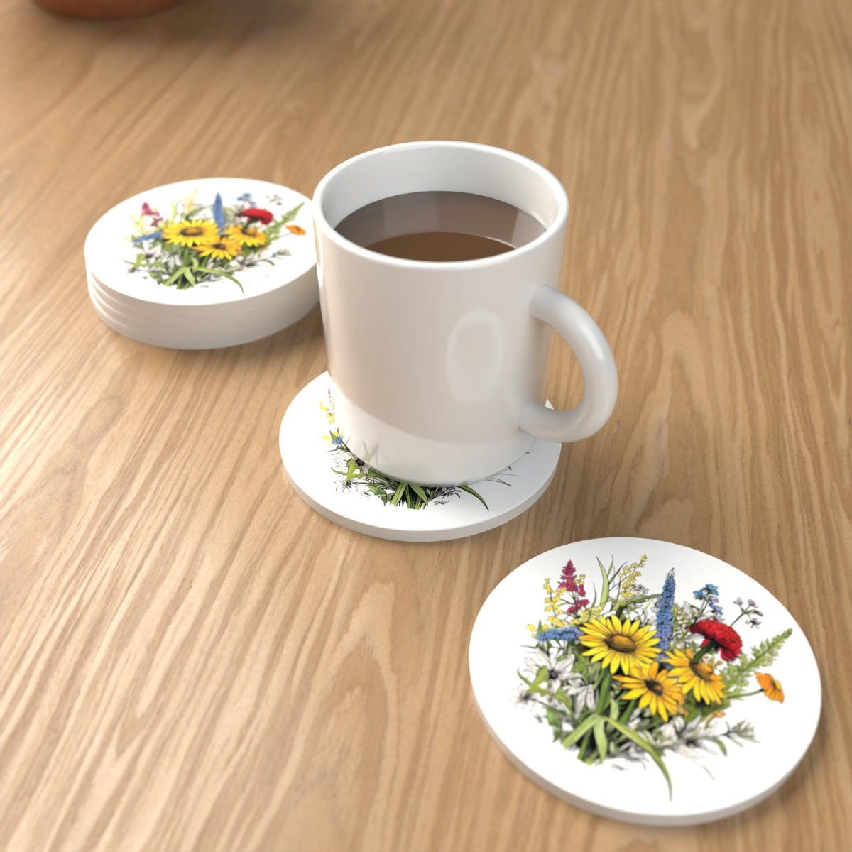 Sunflower Bouquet with Blue Spires Round Ceramic Coasters – Set of 6 – lifestyle mockup with a mug of coffee