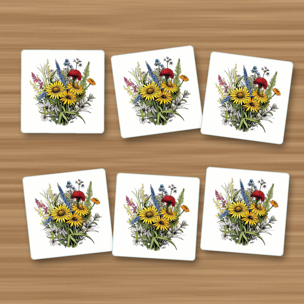 Sunflower Bouquet with Blue Spires square glass coasters, set of 6, on an oak coffee table