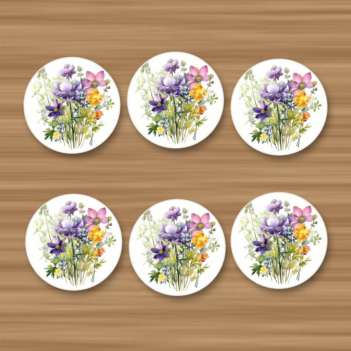 Purple & Pink Wildflower Bouquet round ceramic coasters, set of 6, on an oak coffee table