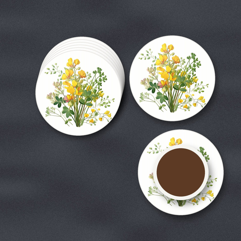 Yellow Buttercup Posy round ceramic coasters stacked on a slate kitchen worktop