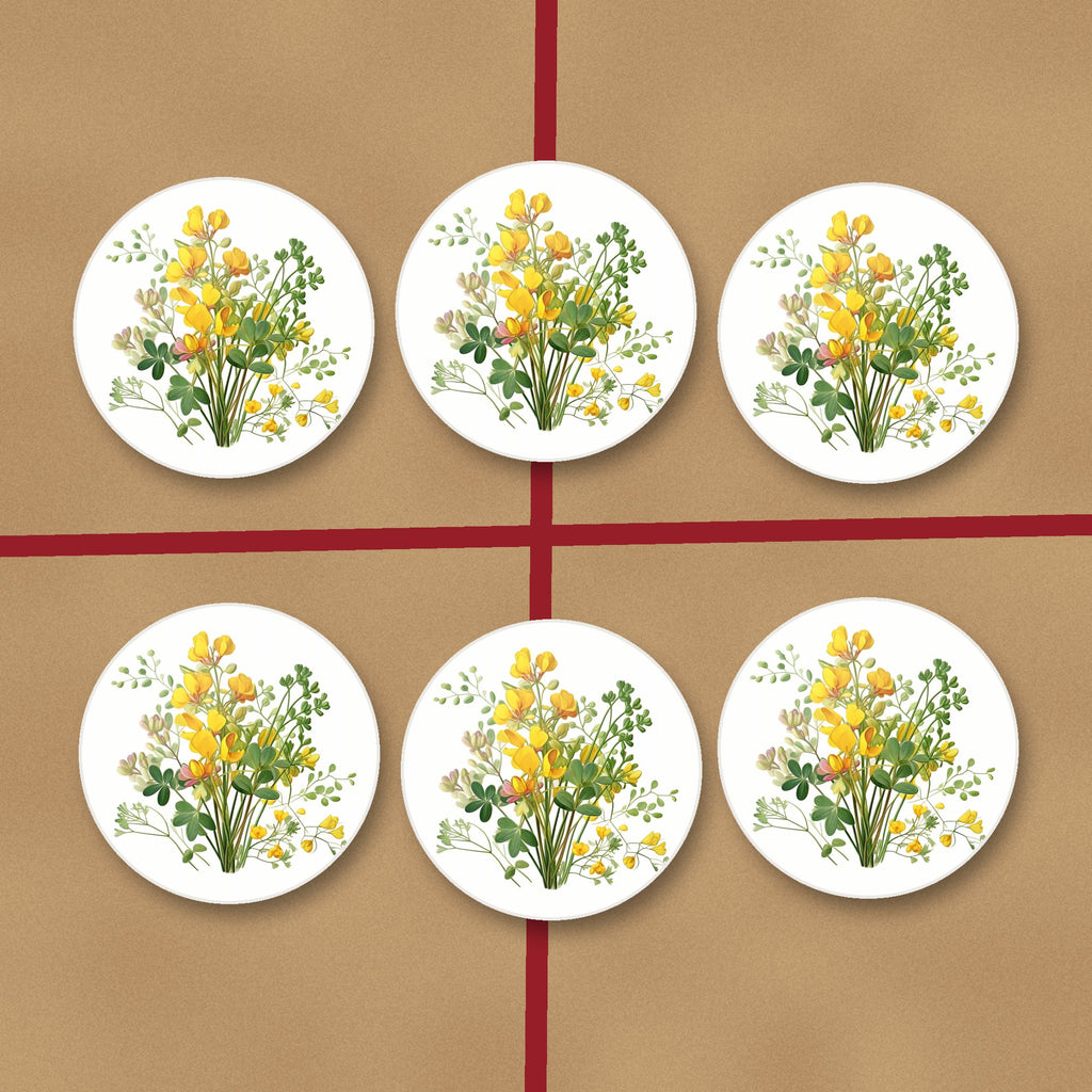 Yellow Buttercup Posy round ceramic coasters on kraft gift wrap