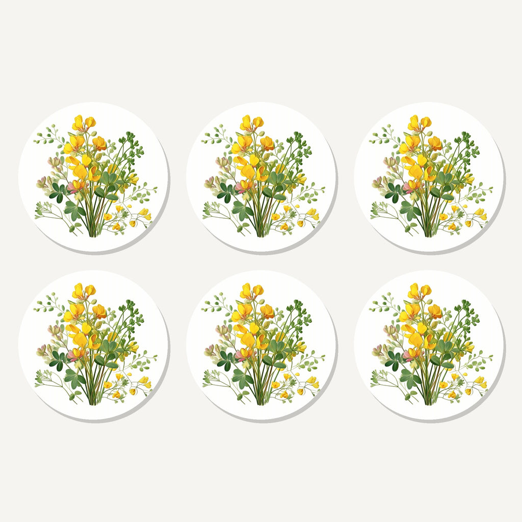 Flat lay of the yellow buttercup posy artwork on six round coasters