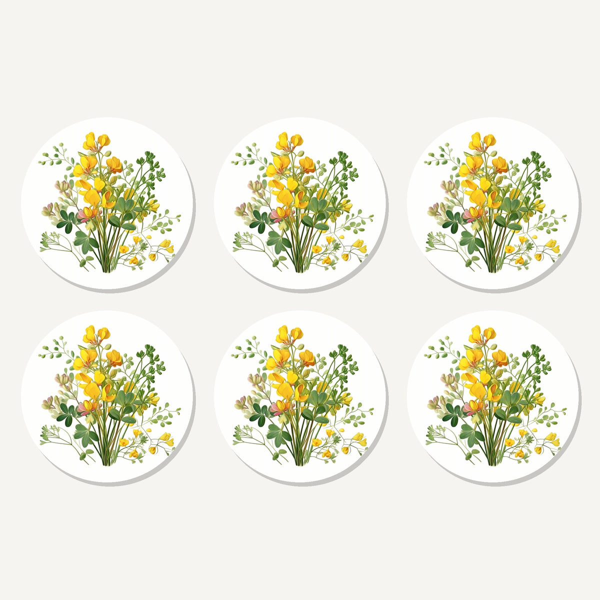Flat lay of the yellow buttercup posy artwork on six round coasters