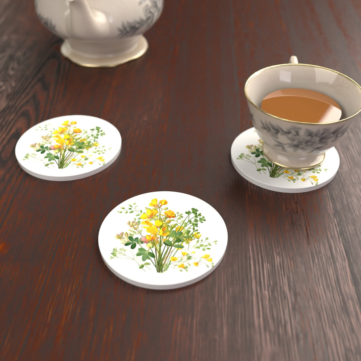 Yellow Buttercup Posy Round Ceramic Coasters – Set of 6 – lifestyle mockup with a teacup