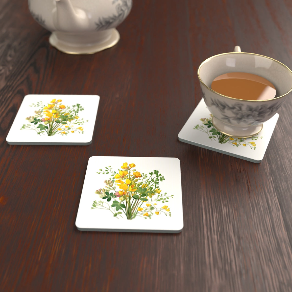 Yellow Buttercup Posy Square Glass Coasters – Set of 6 – lifestyle mockup with a teacup