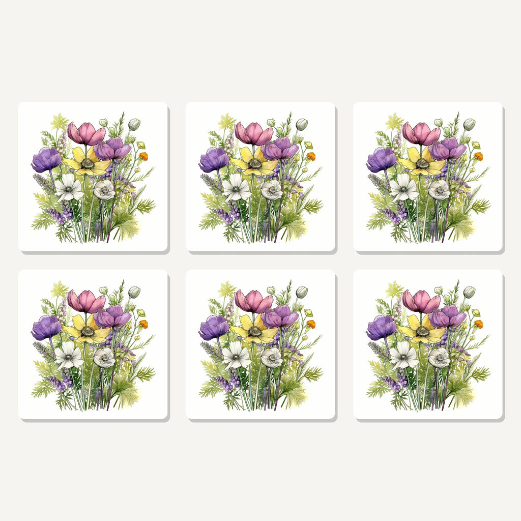 Flat lay of the pink, purple & white wild bouquet artwork on six square coasters