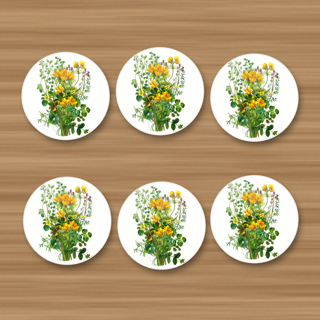 Yellow Wildflowers & Greenery round ceramic coasters, set of 6, on an oak coffee table
