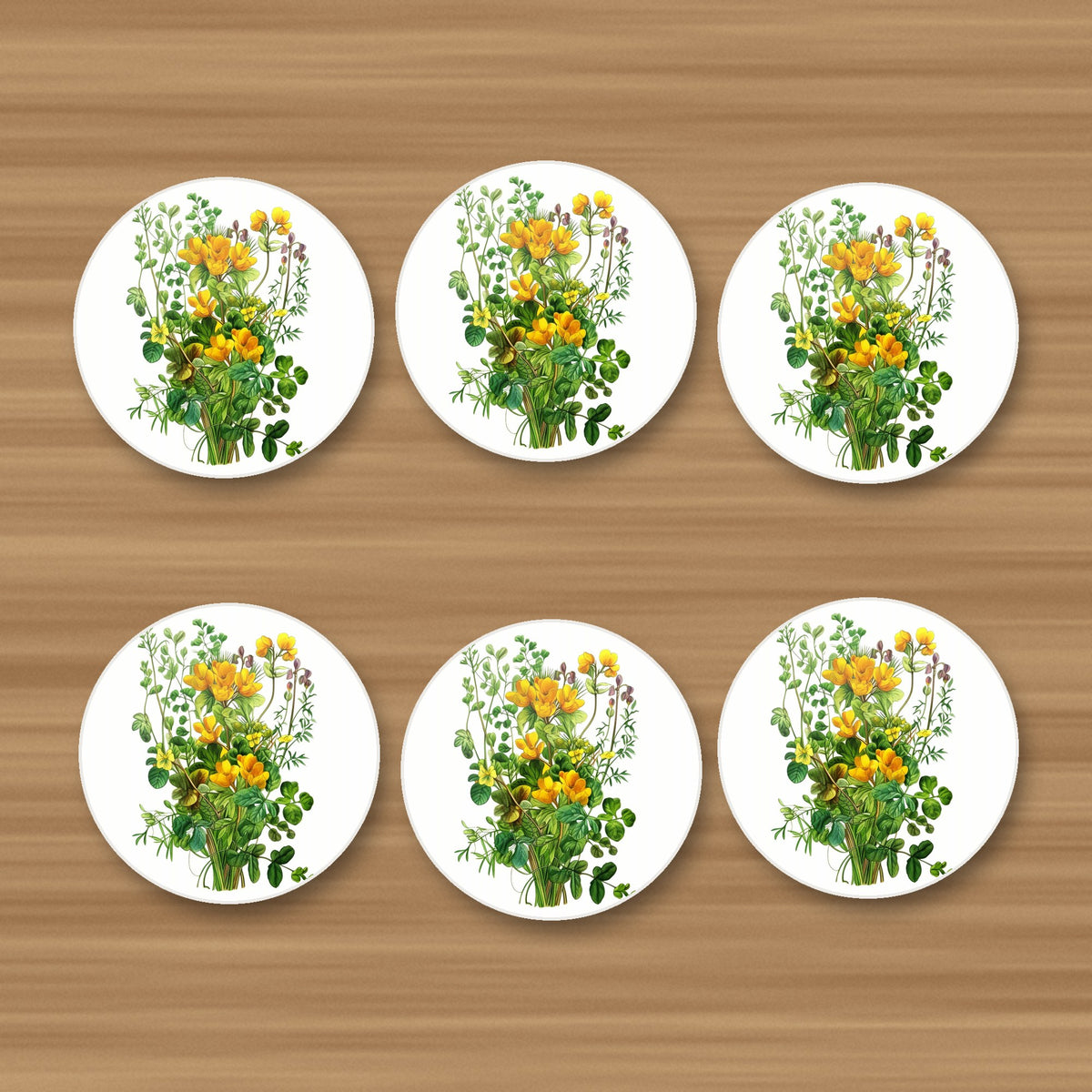 Yellow Wildflowers & Greenery round ceramic coasters, set of 6, on an oak coffee table