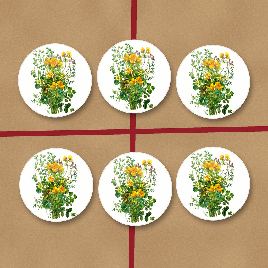 Yellow Wildflowers & Greenery round ceramic coasters on kraft gift wrap