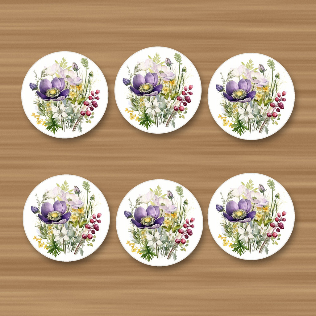 Purple Anemone & Berry Bouquet round ceramic coasters, set of 6, on an oak coffee table