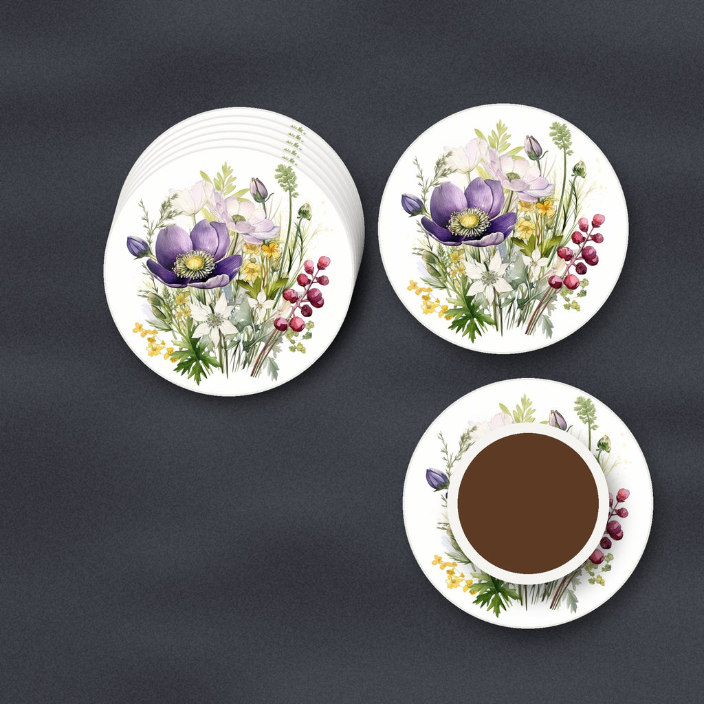 Purple Anemone & Berry Bouquet round ceramic coasters stacked on a slate kitchen worktop