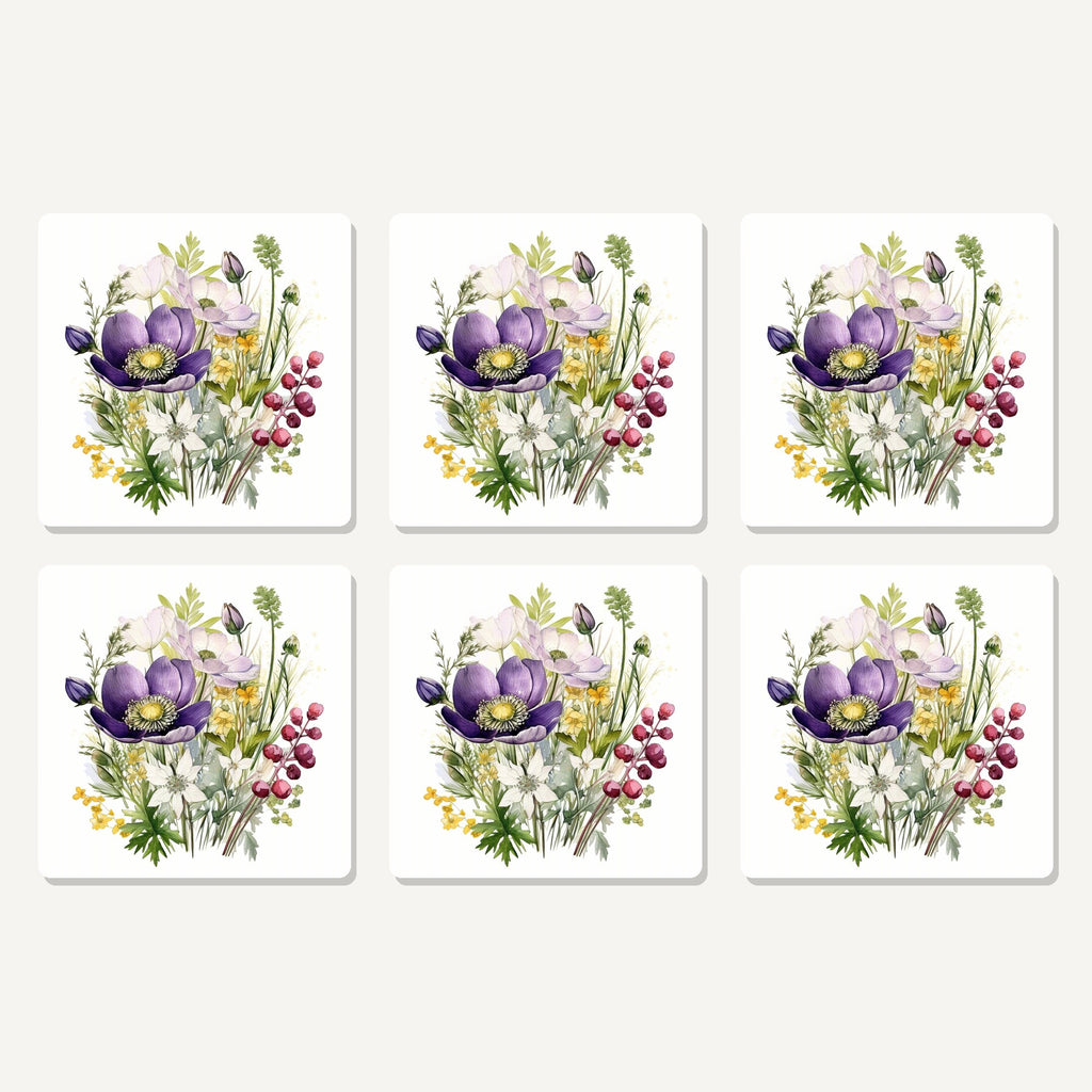 Flat lay of the purple anemone & berry bouquet artwork on six square coasters