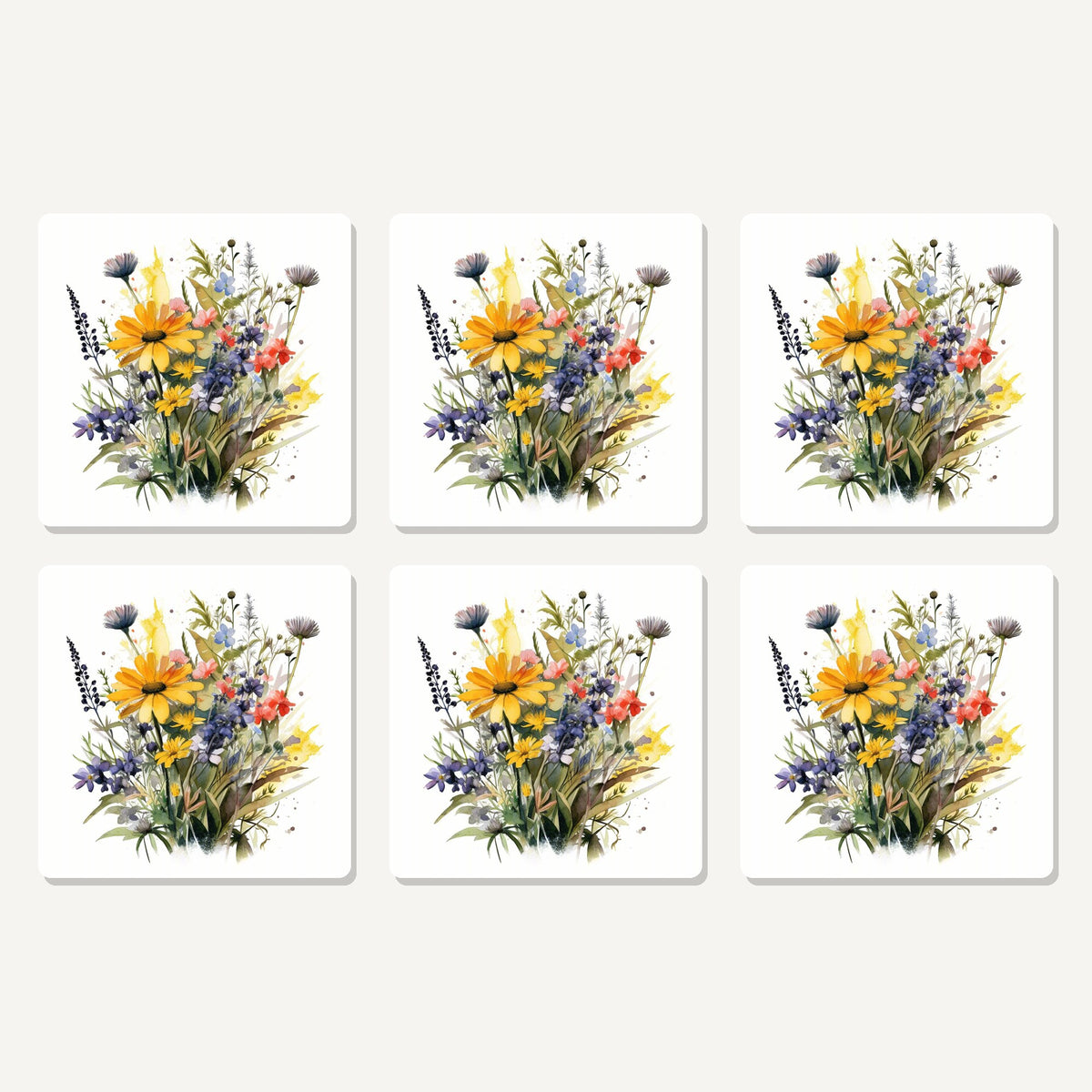 Flat lay of the yellow & blue meadow bouquet artwork on six square coasters