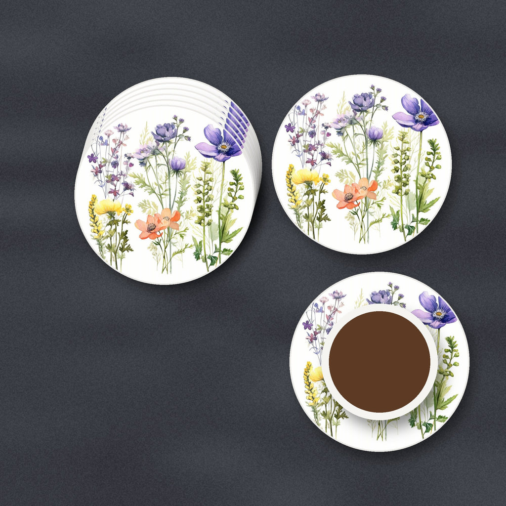 Delicate Purple & Peach Wildflowers round ceramic coasters stacked on a slate kitchen worktop