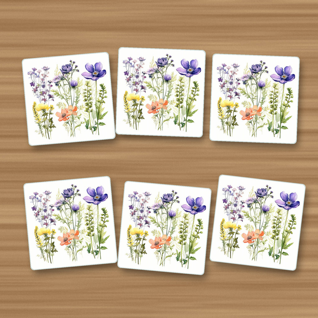Delicate Purple & Peach Wildflowers square glass coasters, set of 6, on an oak coffee table