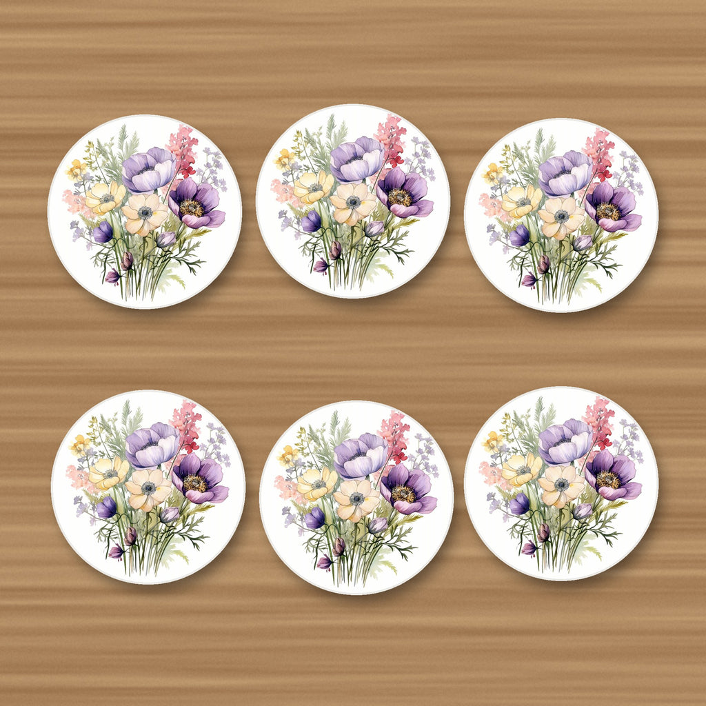 Lilac & Cream Anemone Bouquet round ceramic coasters, set of 6, on an oak coffee table