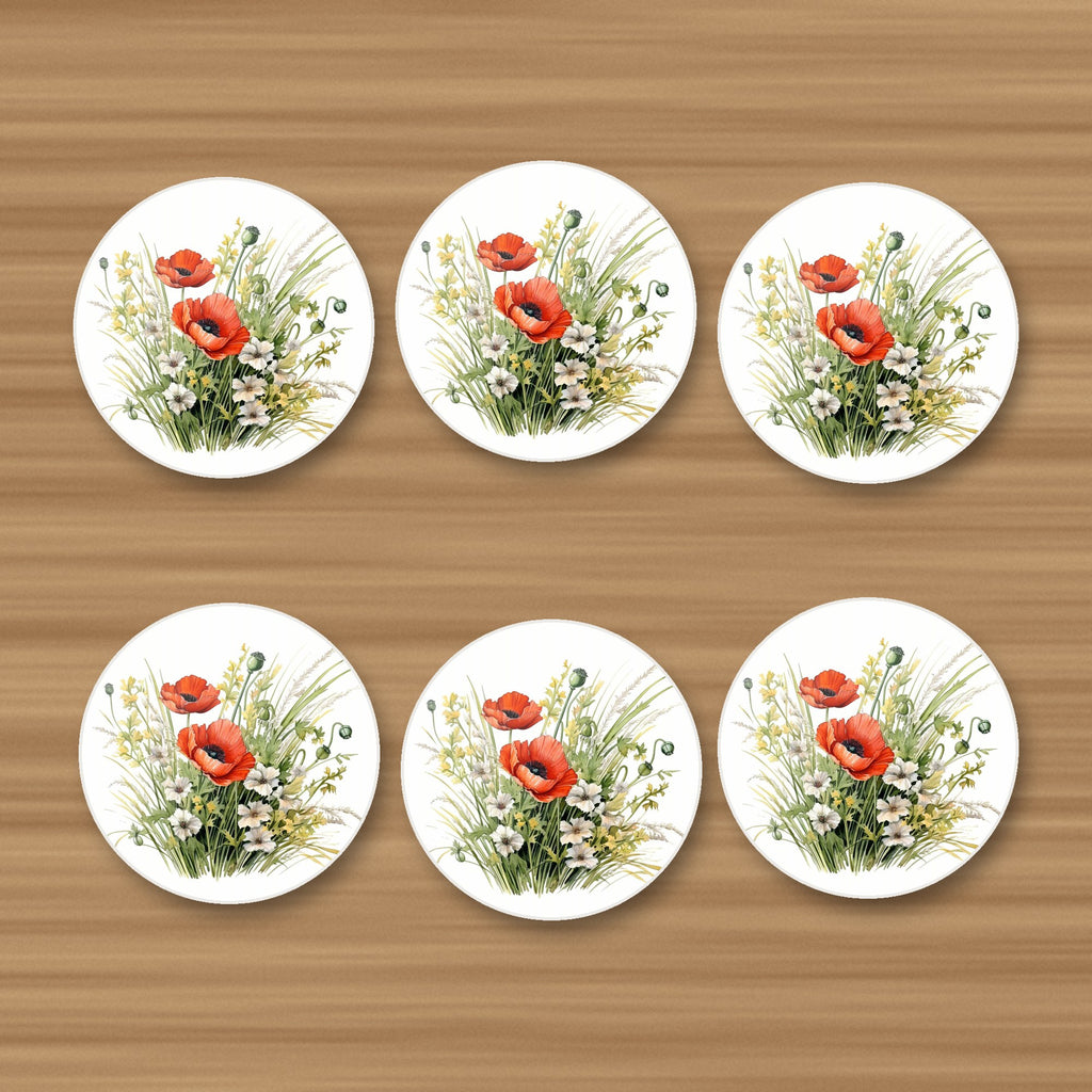 Red Poppy & Meadow Grass round ceramic coasters, set of 6, on an oak coffee table