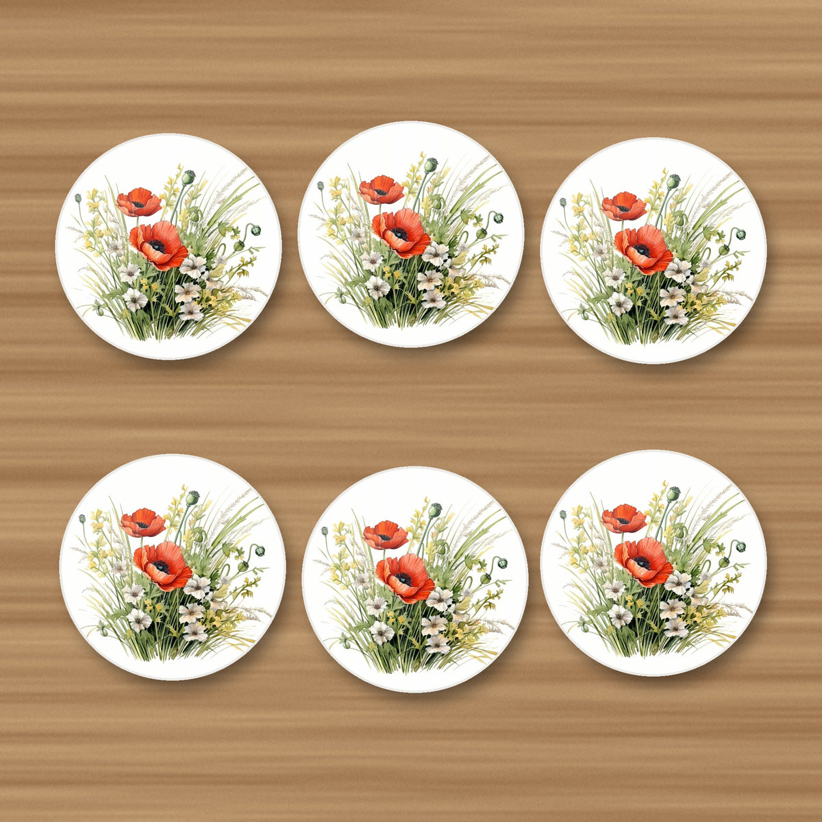 Red Poppy & Meadow Grass round ceramic coasters, set of 6, on an oak coffee table