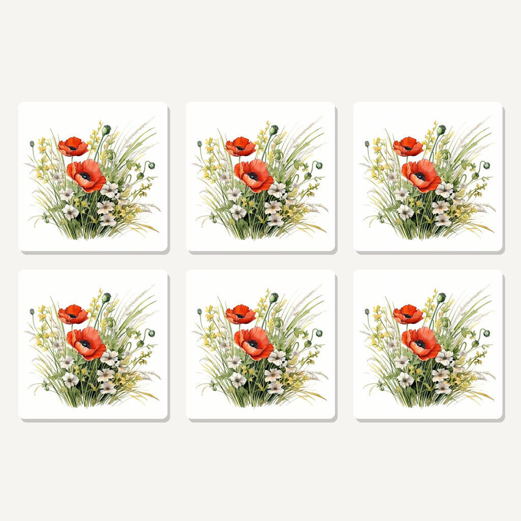 Flat lay of the red poppy & meadow grass artwork on six square coasters