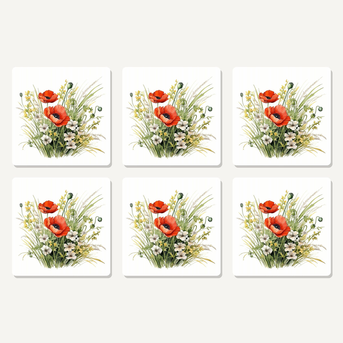 Flat lay of the red poppy & meadow grass artwork on six square coasters