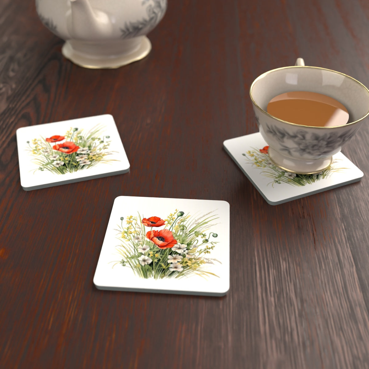Red Poppy & Meadow Grass Square Glass Coasters – Set of 6 – lifestyle mockup with a teacup