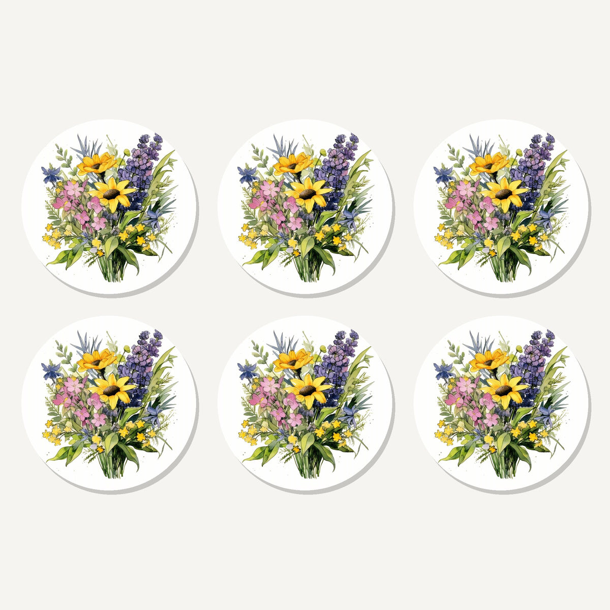 Flat lay of the sunny meadow bouquet with lavender artwork on six round coasters