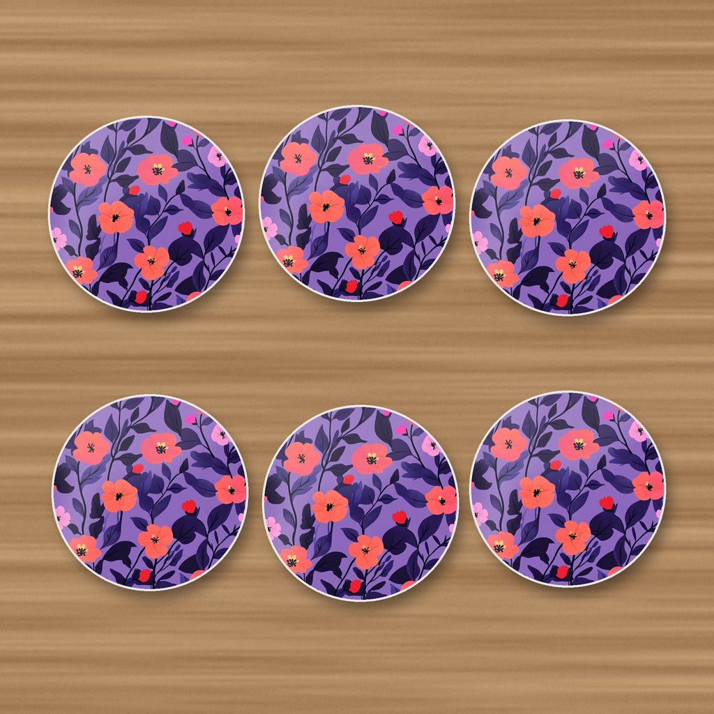 Coral Flowers on Purple Pattern round ceramic coasters, set of 6, on an oak coffee table