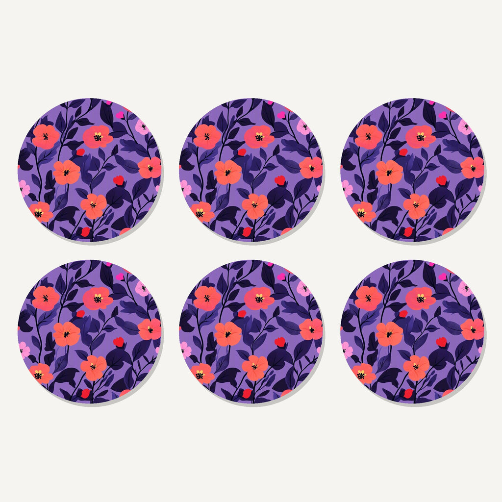 Flat lay of the coral flowers on purple pattern artwork on six round coasters