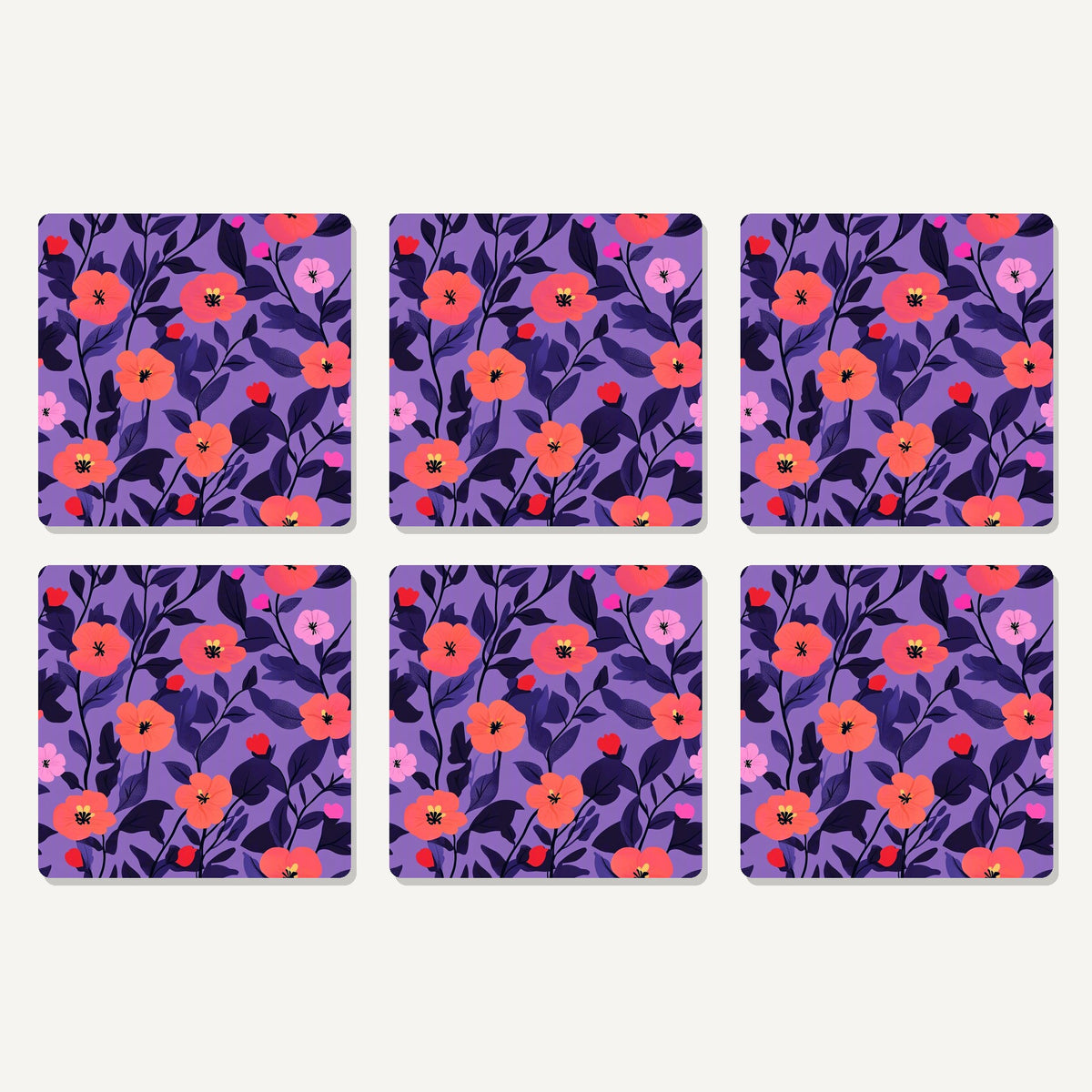 Flat lay of the coral flowers on purple pattern artwork on six square coasters