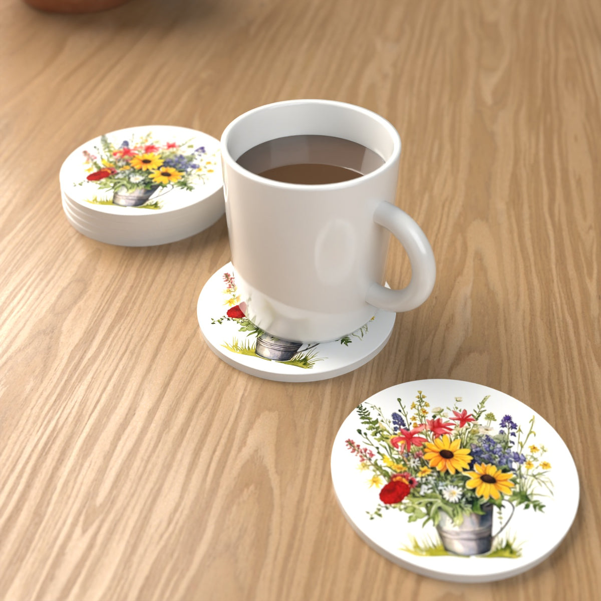 Sunflowers in a Tin Bucket Round Ceramic Coasters – Set of 6 – lifestyle mockup with a mug of coffee