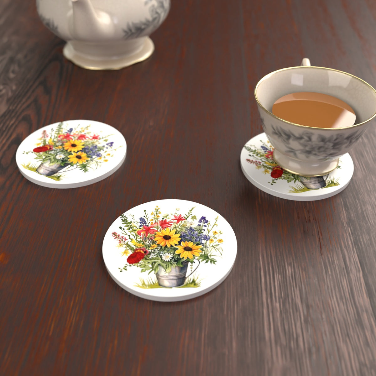 Sunflowers in a Tin Bucket Round Ceramic Coasters – Set of 6 – lifestyle mockup with a teacup