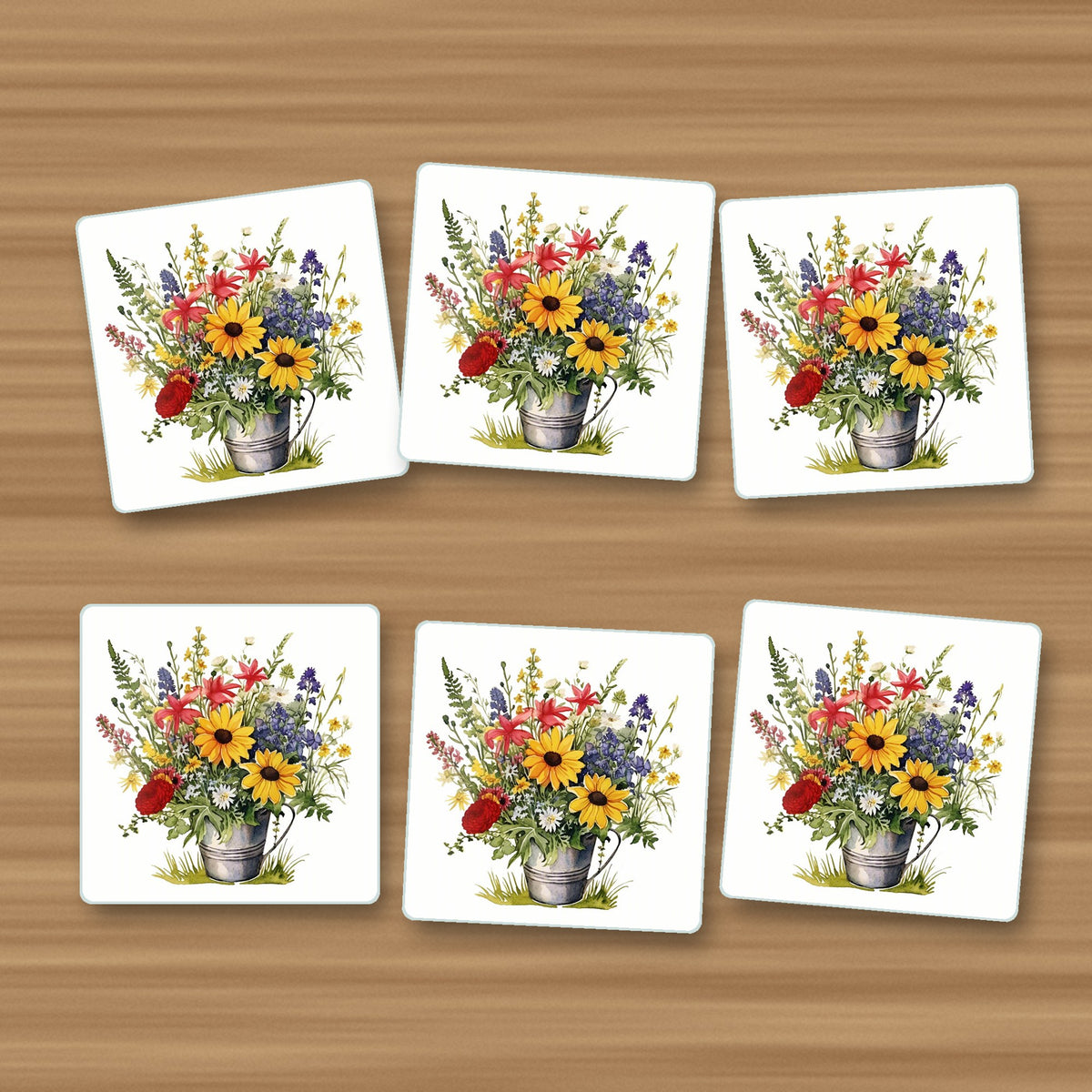 Sunflowers in a Tin Bucket square glass coasters, set of 6, on an oak coffee table