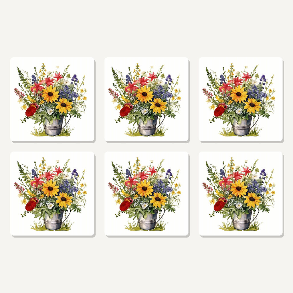 Flat lay of the sunflowers in a tin bucket artwork on six square coasters