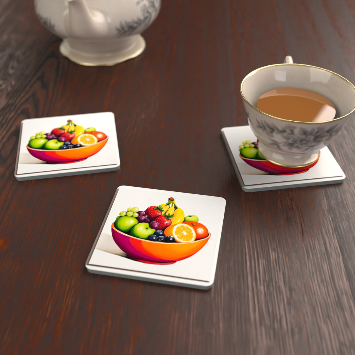 Fruit in an Orange Bowl Square Glass Coasters – Set of 6 – lifestyle mockup with a teacup