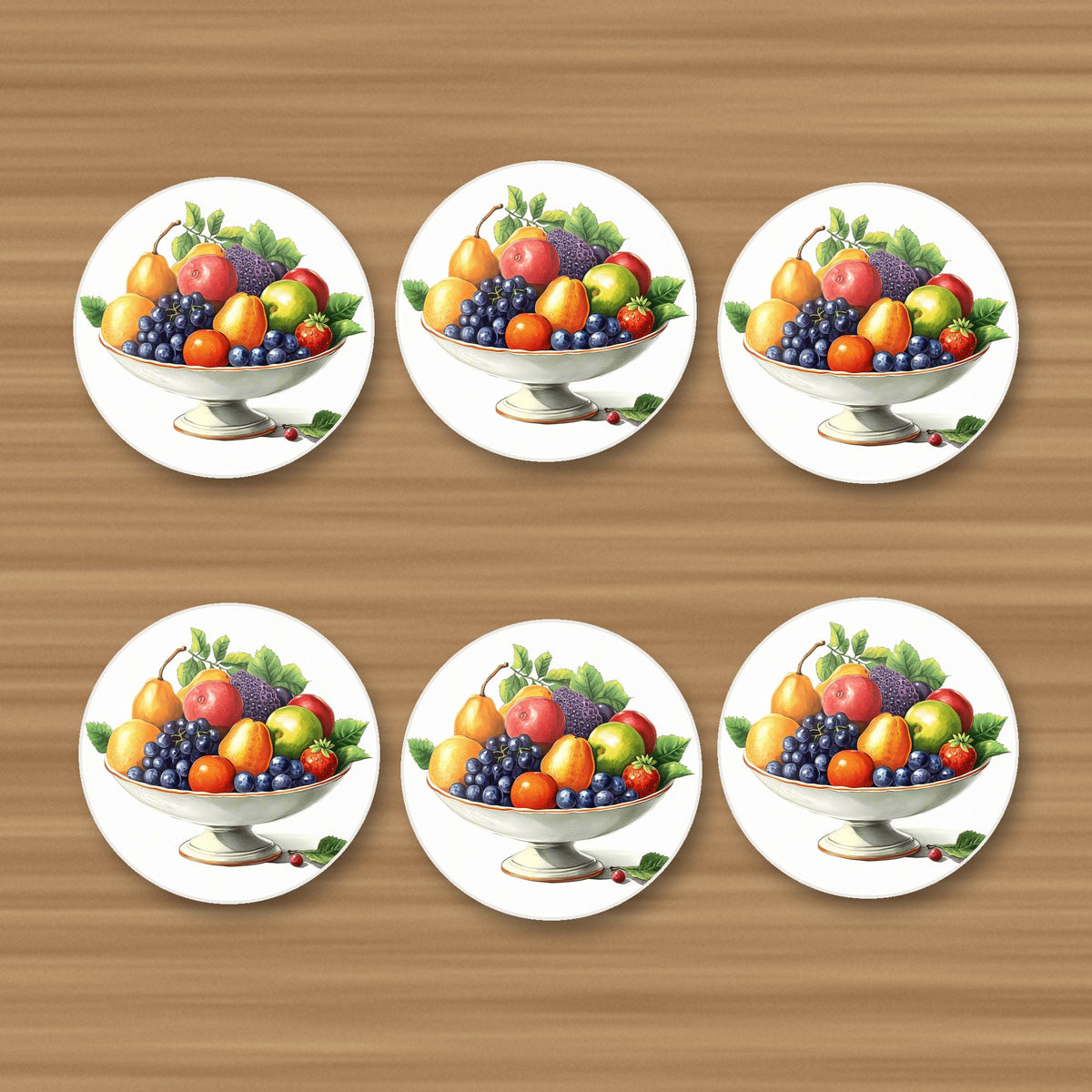 Fruit in a Footed Bowl round ceramic coasters, set of 6, on an oak coffee table