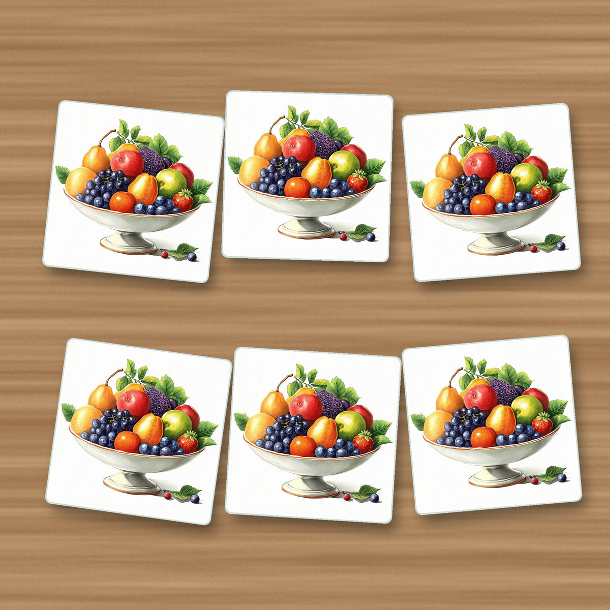 Fruit in a Footed Bowl square glass coasters, set of 6, on an oak coffee table