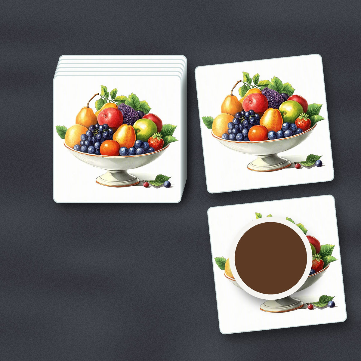 Fruit in a Footed Bowl square glass coasters stacked on a slate kitchen worktop