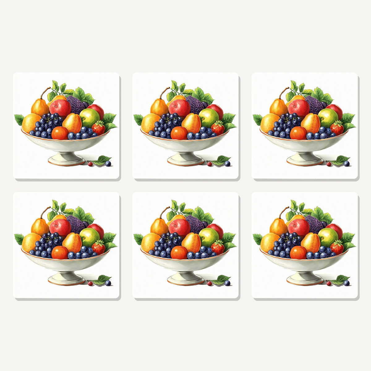 Flat lay of the fruit in a footed bowl artwork on six square coasters