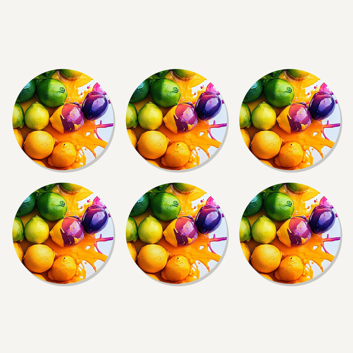 Flat lay of the lemons, limes & plums splash artwork on six round coasters