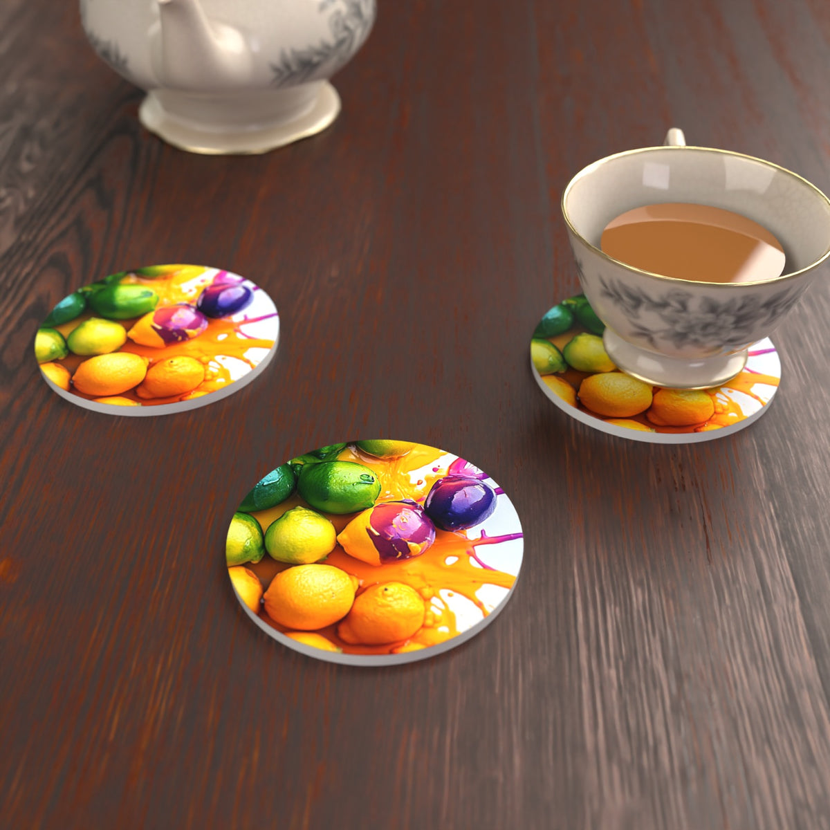 Lemons, Limes & Plums Splash Round Ceramic Coasters – Set of 6 – lifestyle mockup with a teacup