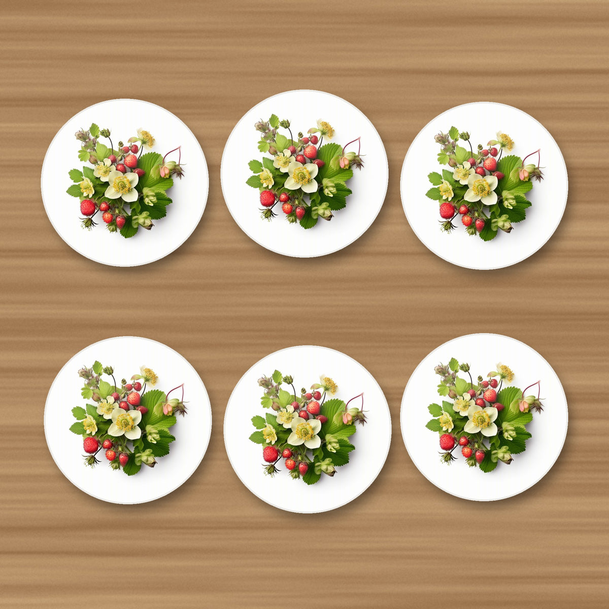 Strawberries & Blossom round ceramic coasters, set of 6, on an oak coffee table