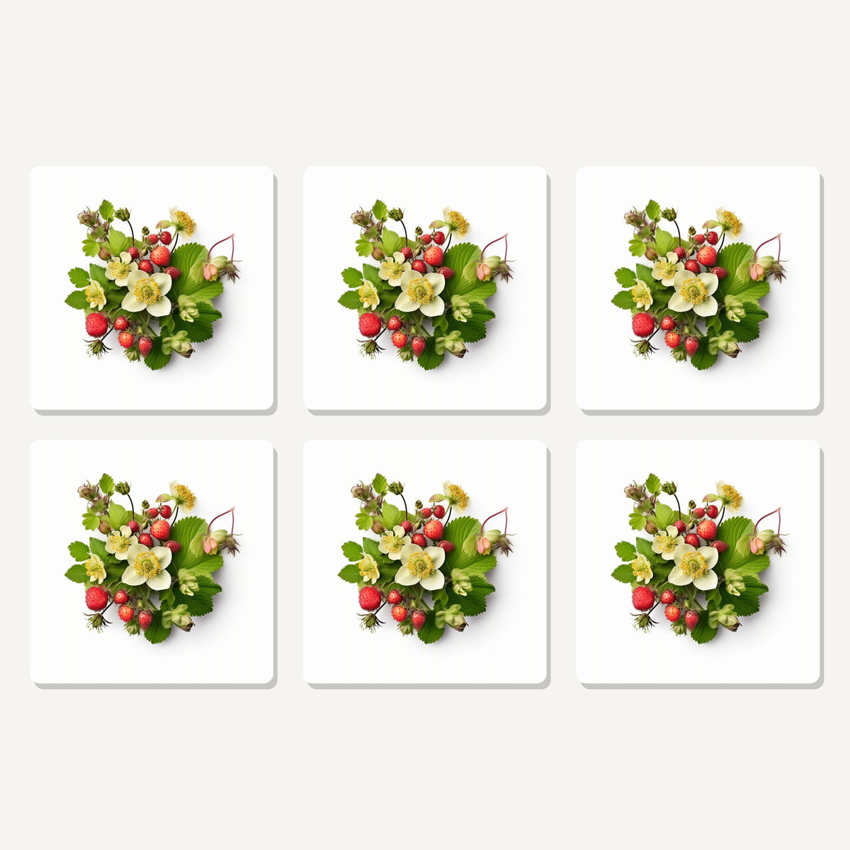Flat lay of the strawberries & blossom artwork on six square coasters